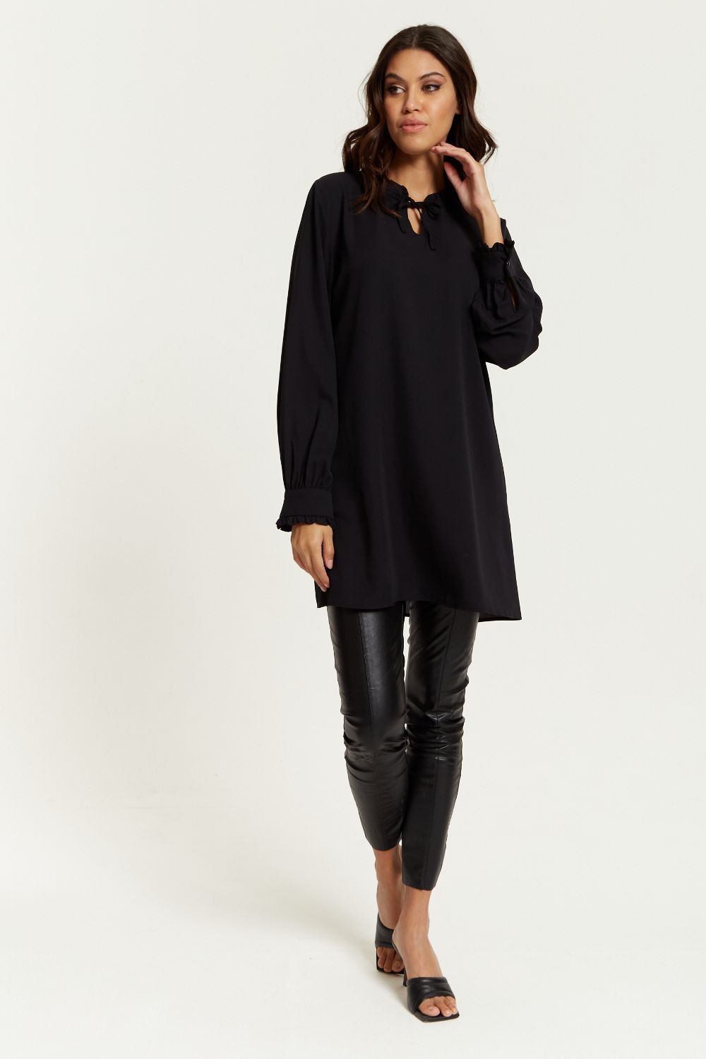 Oversized Tunic with Ruffle Neck Detailed in Black