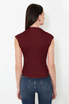 High Neck Asymmetric Fitted Knit Blouse with Draped/Gathered Detail
