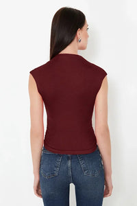 High Neck Asymmetric Fitted Knit Blouse with Draped/Gathered Detail