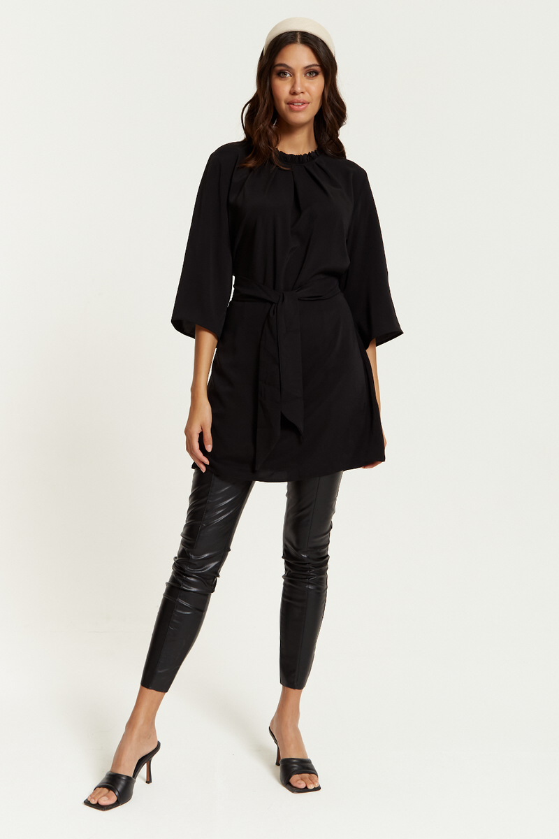 Tie Waisted Ruffle Neck Tunic with 3/4 Sleeves in Black
