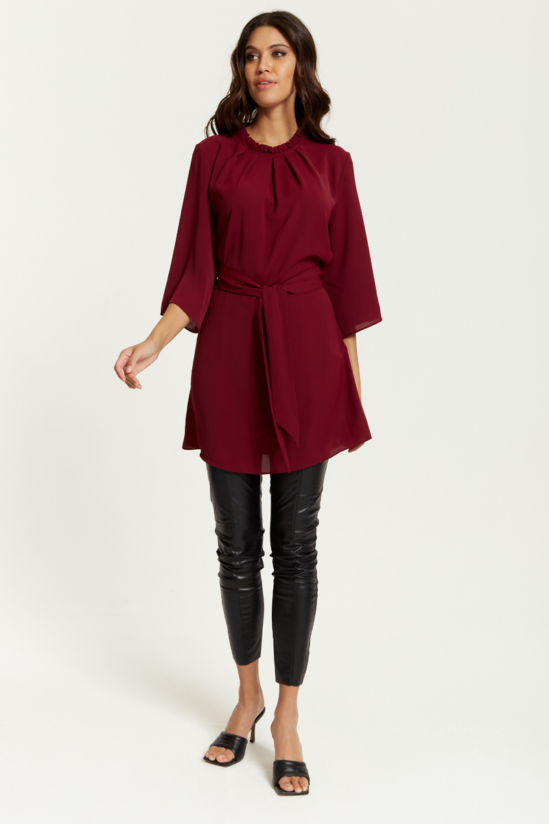 Tie Waisted Ruffle Neck Tunic with 3/4 Sleeves in Burgundy