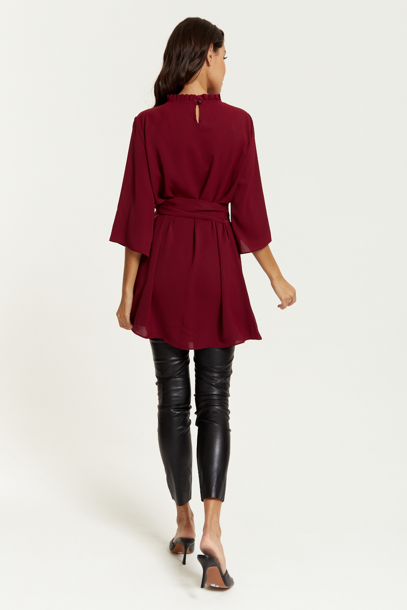 Tie Waisted Ruffle Neck Tunic with 3/4 Sleeves in Burgundy
