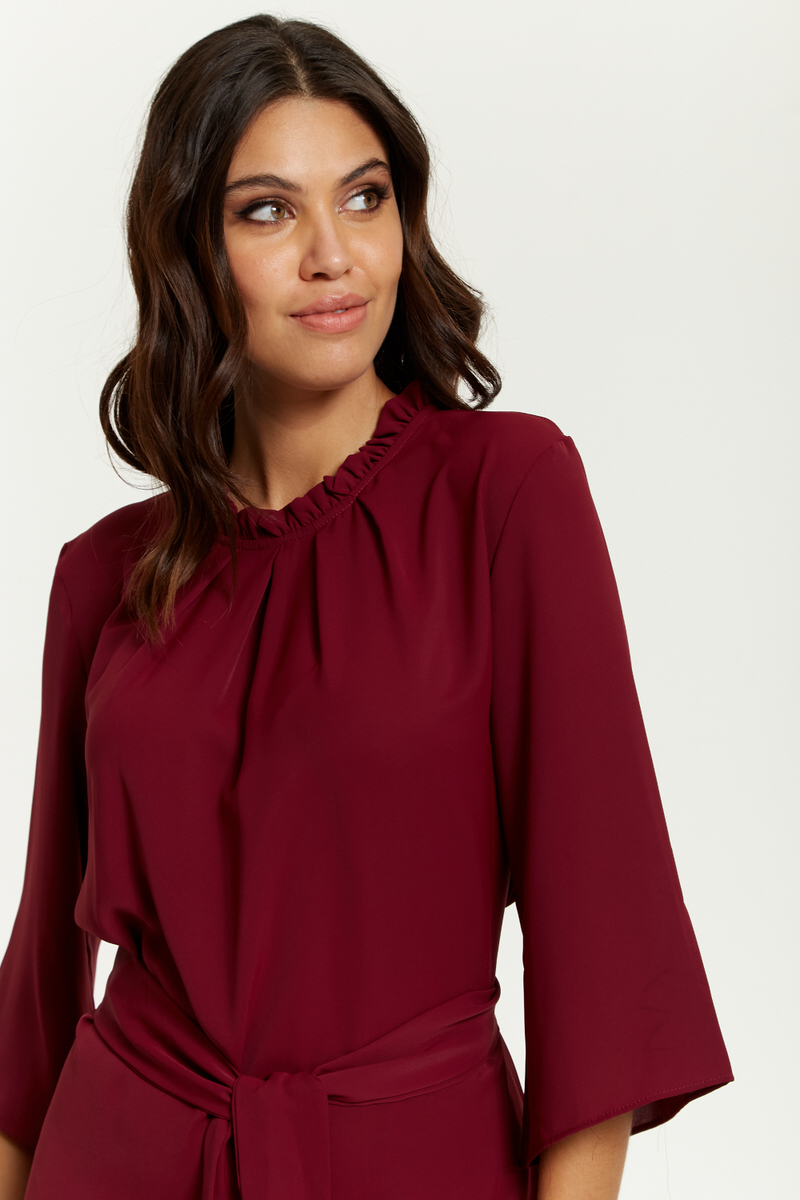 Tie Waisted Ruffle Neck Tunic with 3/4 Sleeves in Burgundy