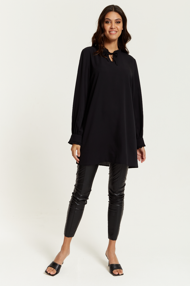 Oversized Tunic with Ruffle Neck Detailed in Black