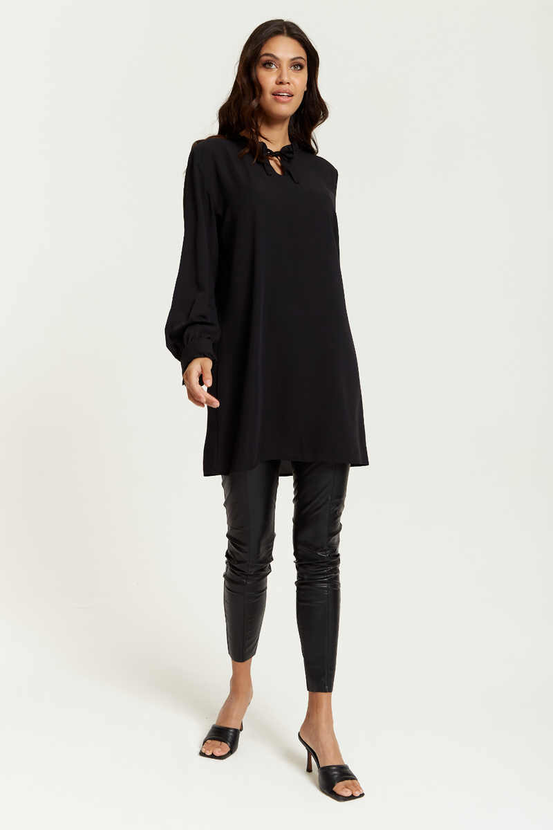 Oversized Tunic with Ruffle Neck Detailed in Black